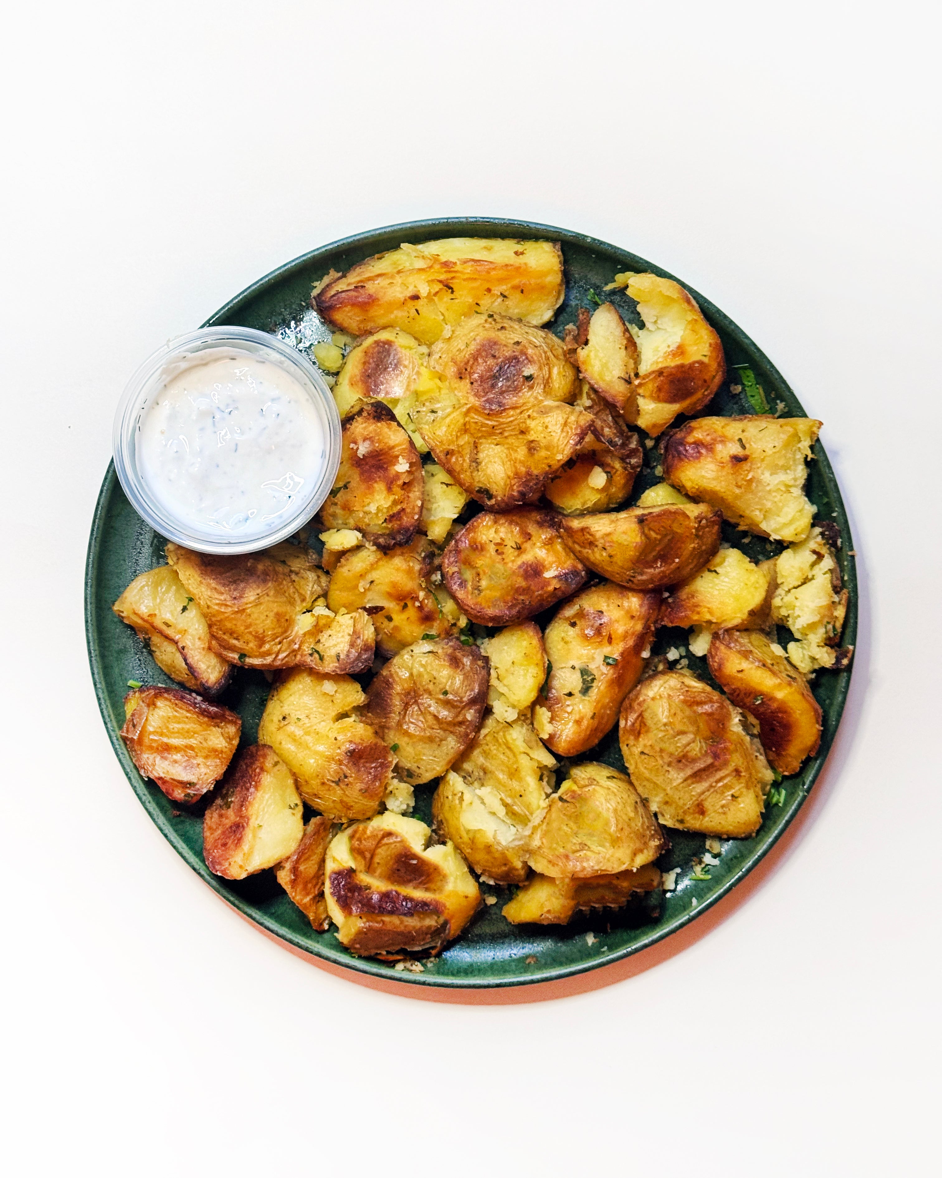Crispy Smashed Potatoes with Herby Sour Cream