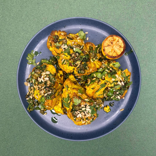 Whole Roasted Turmeric Cauliflower with Capers and Lemon