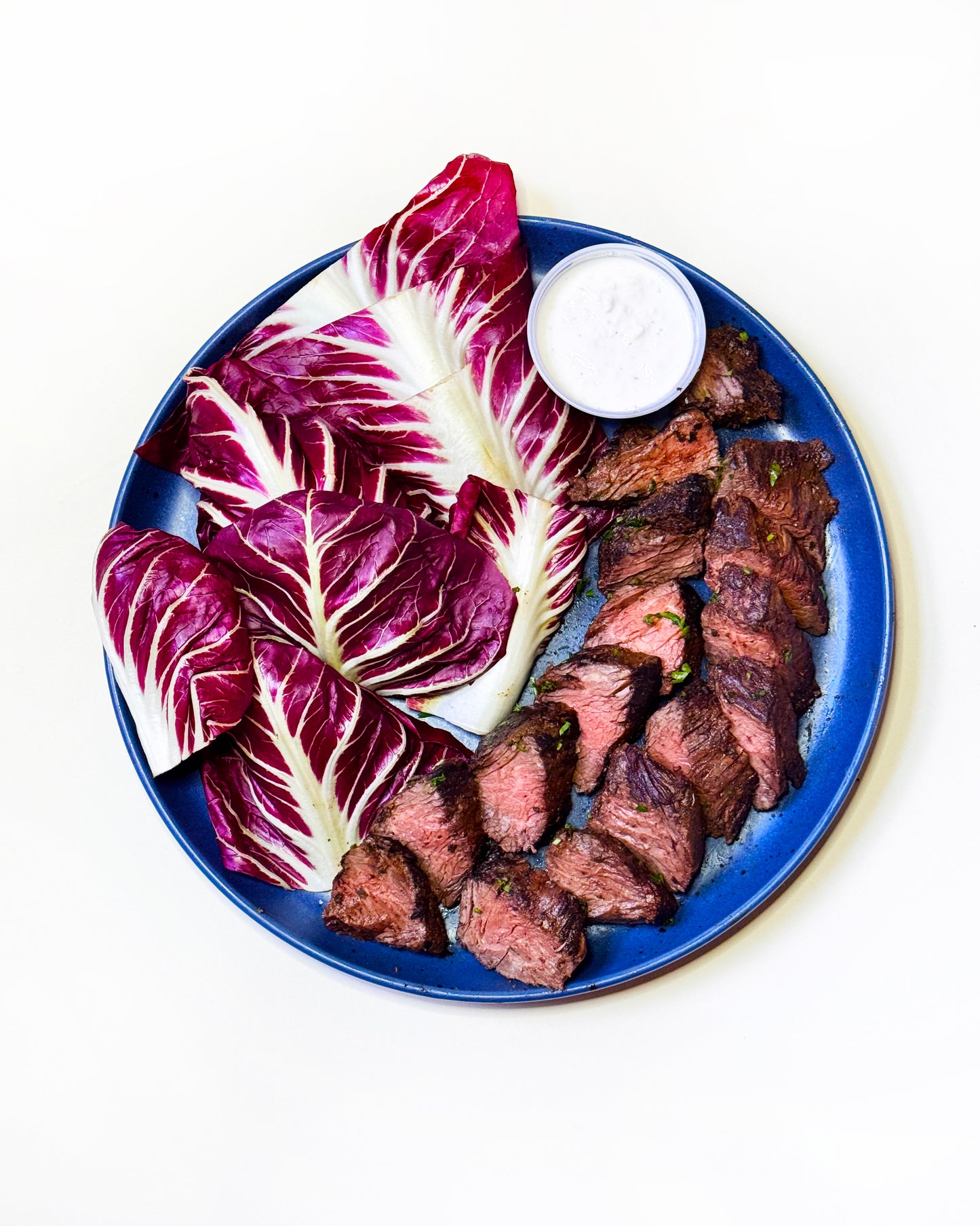 Balsamic-Glazed Prime Hanger Steak with Radicchio and Horseradish Crème Fraîche