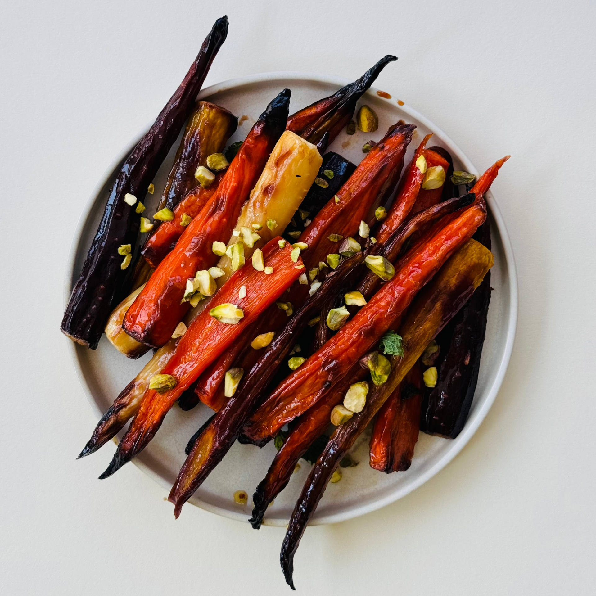 Whole Roasted Date-Glazed Carrots with Pistachios