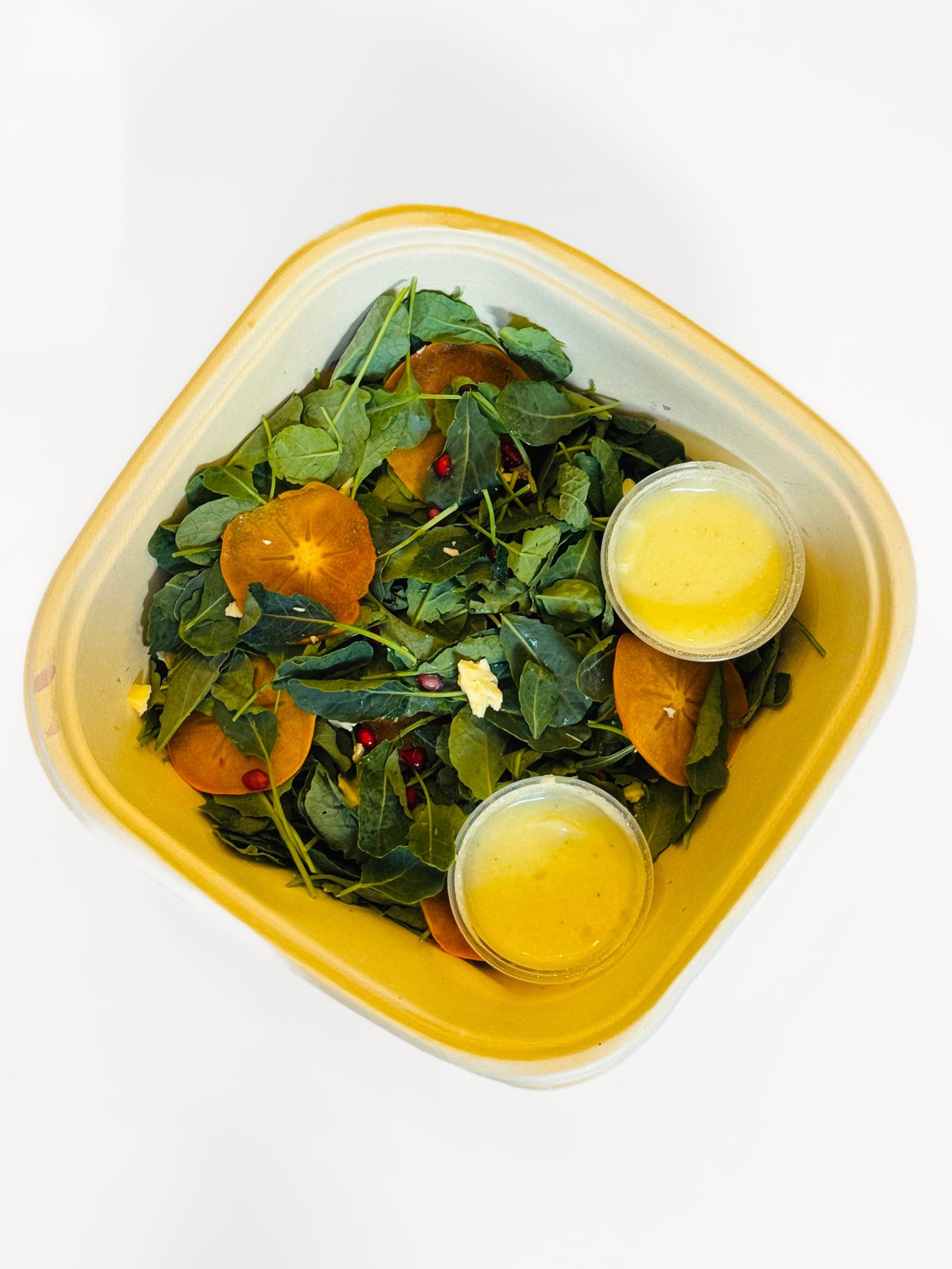 Baby Kale Salad with Persimmon, Walnut, and Aged Cheddar