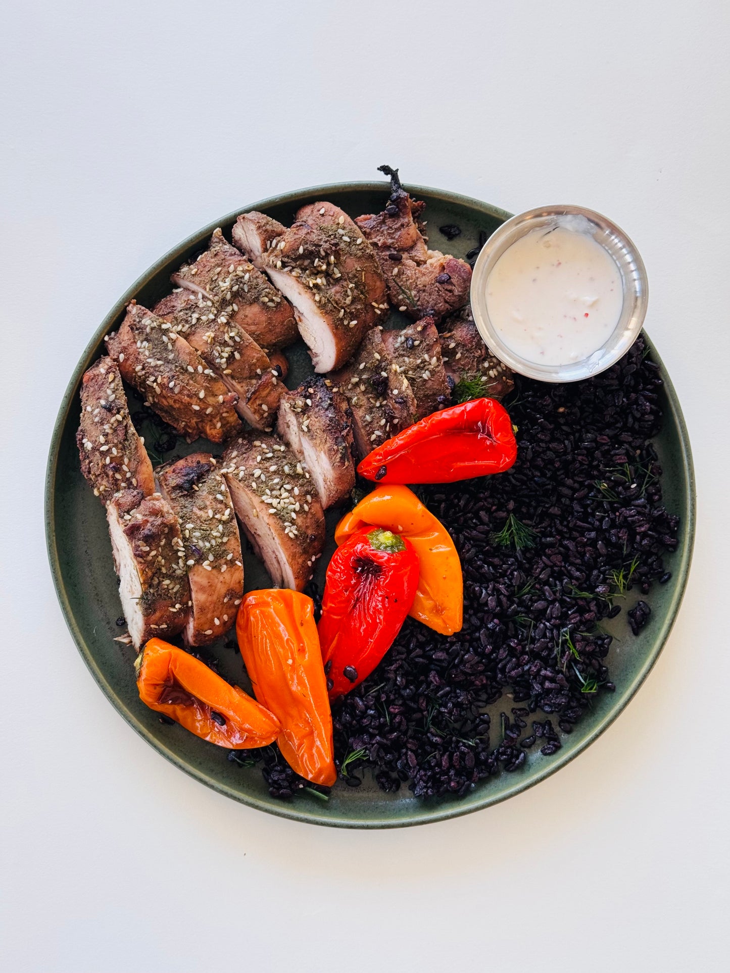 Pomegranate  Molasses Za'atar Chicken with Black Rice, Roasted Peppers, & Feta Sauce