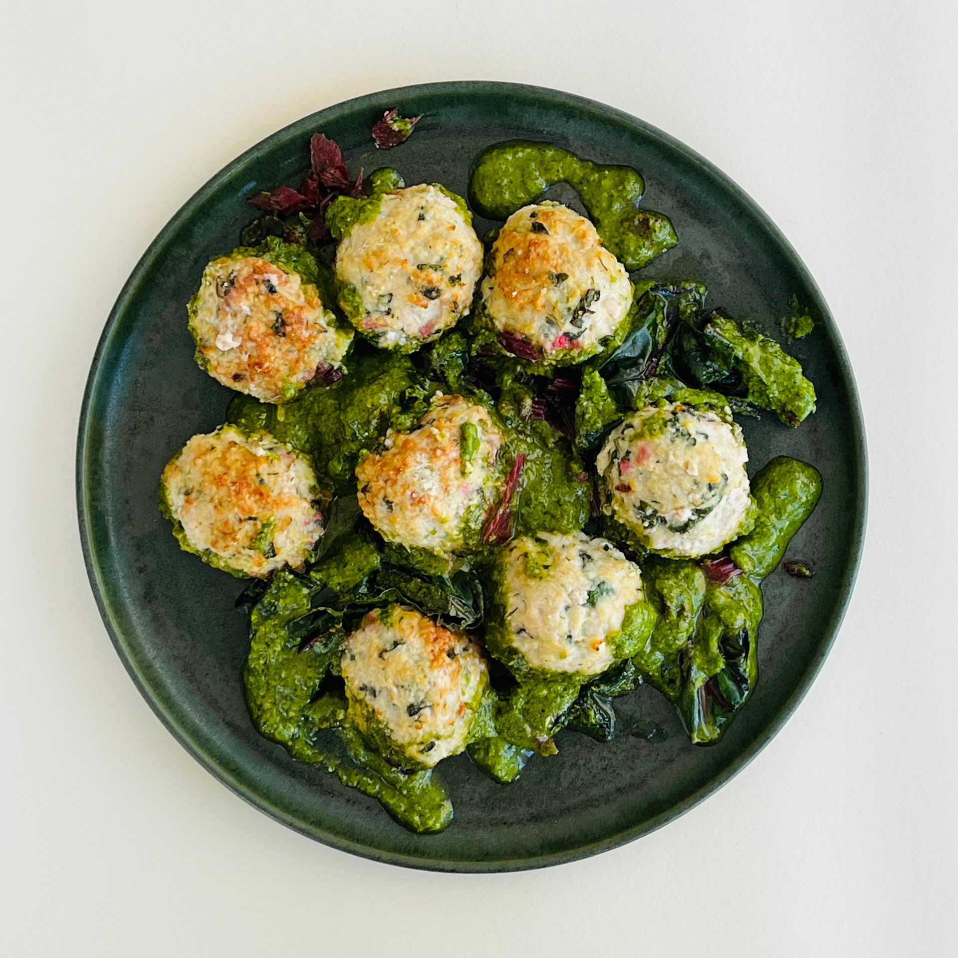 Parmesan Chicken Meatballs with Pesto and Swiss Chard