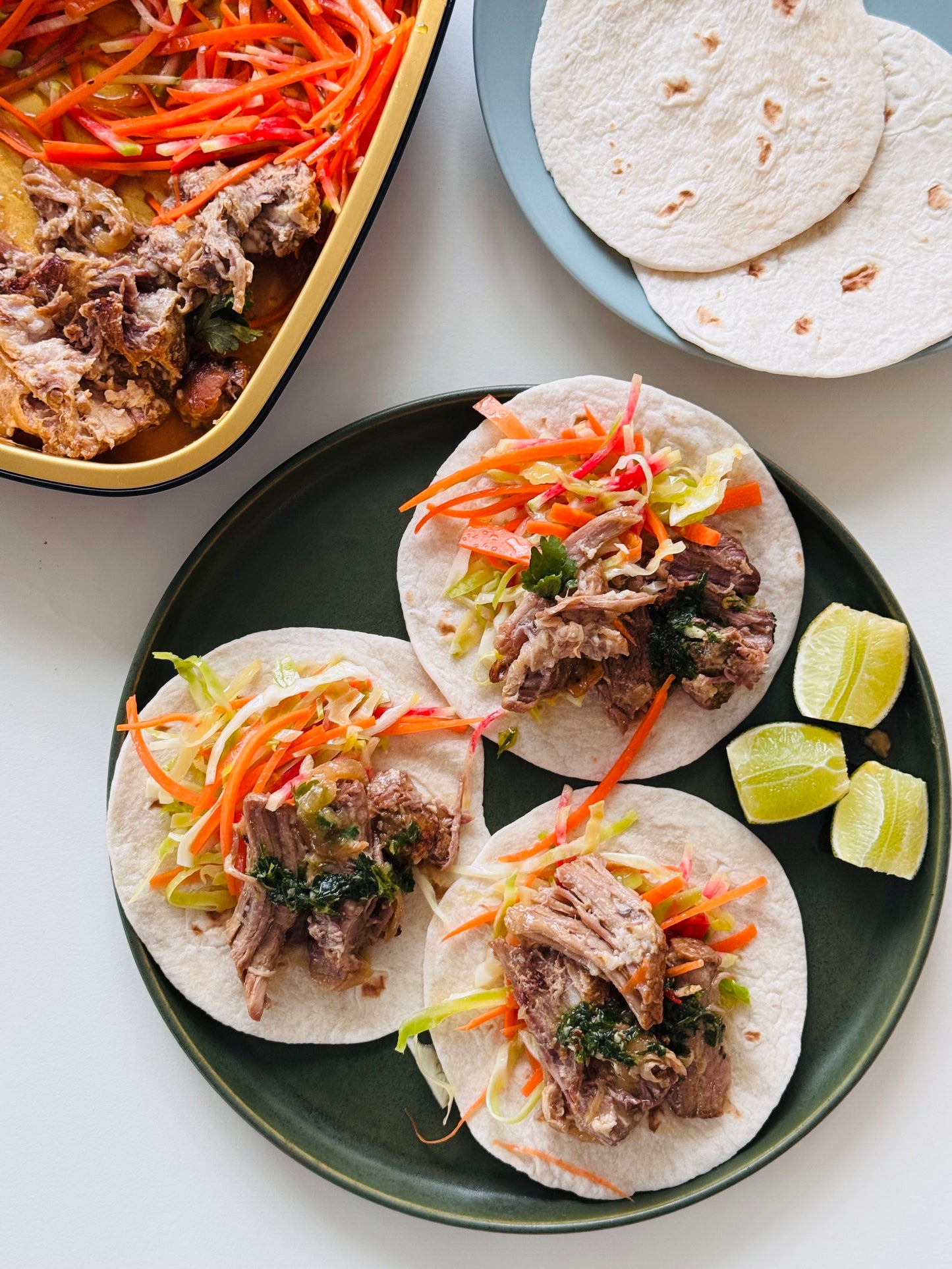 Pork Tacos with Salsa Verde and Spring Slaw