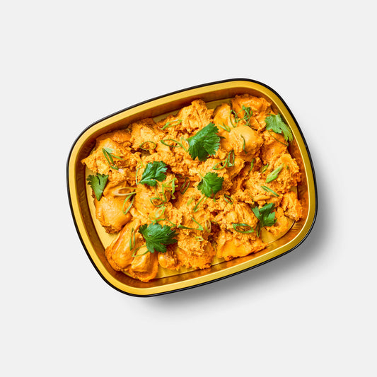 Indian Butter Chicken With Basmati Rice And Peas