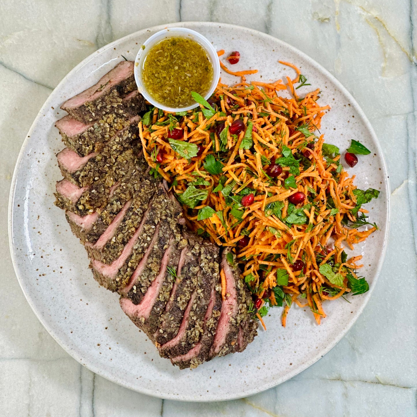Mediterranean Herb Steak with Carrot and Pomegranate Salad